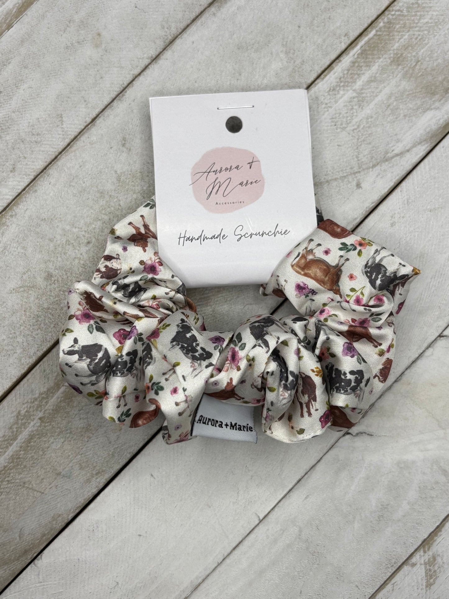 White Cows With Purple Flowers