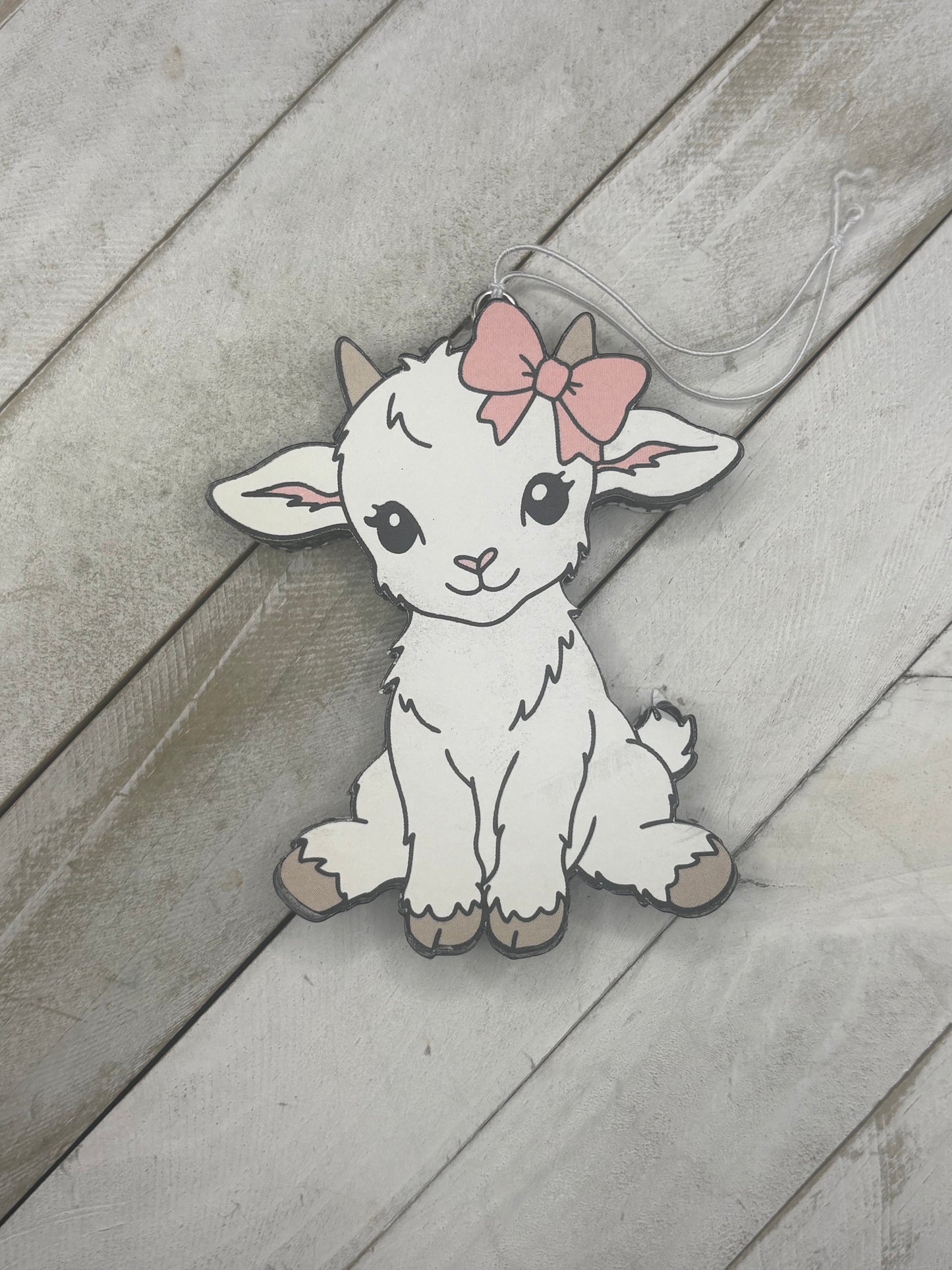 Goat with Bow